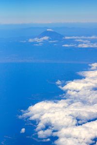 From the window of the airplane , Mt. Fuji