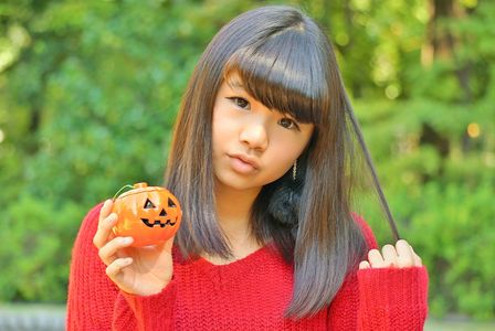 A girl and a pumpkin