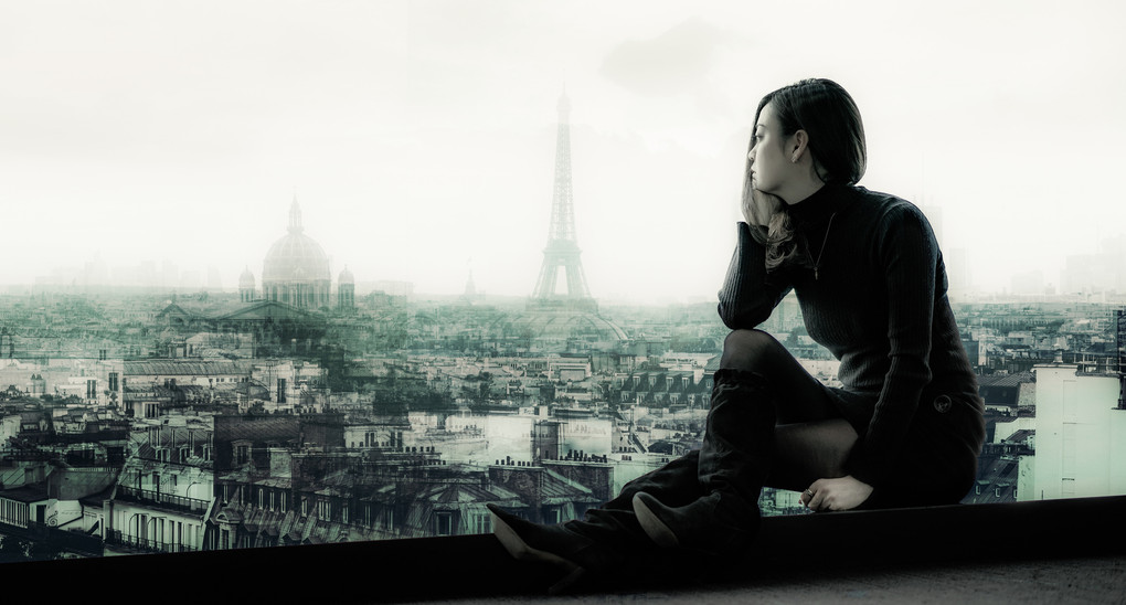 a girl dreaming about Paris