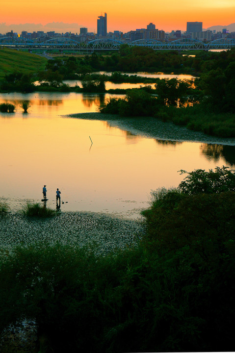 fishermen in the twilight