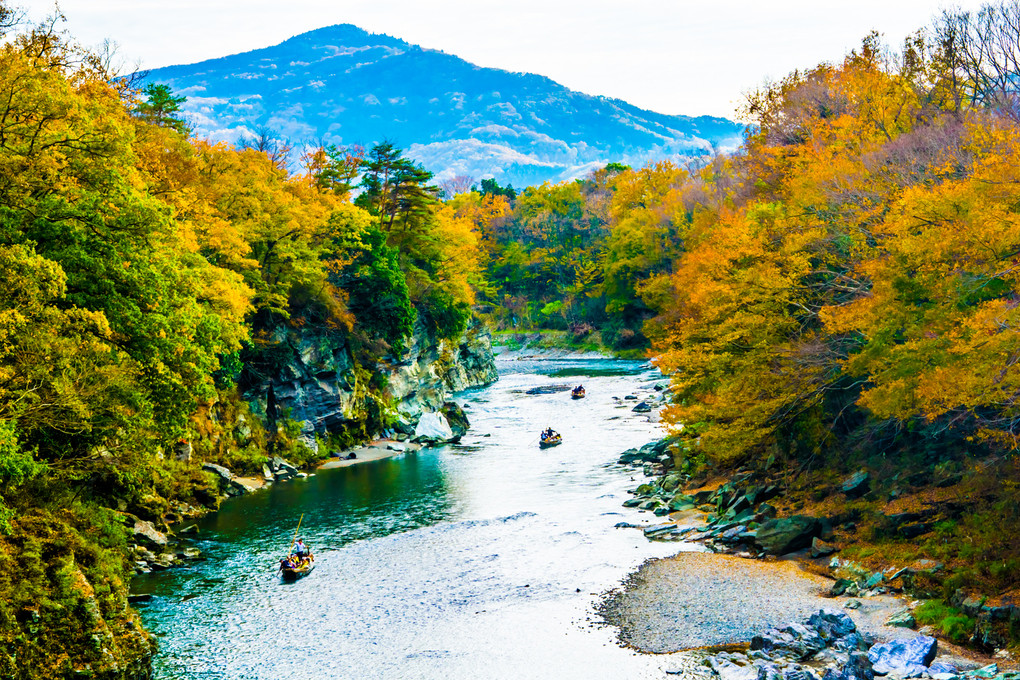 River boating with autumn colors