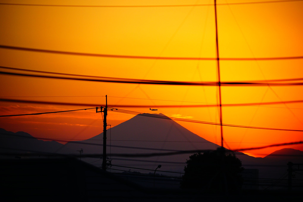 正月21日　わが家から見える富士山への日没 