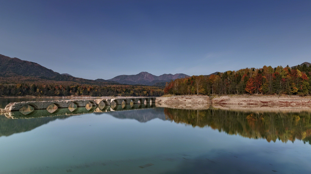 Reflection of Bridge and autumn 