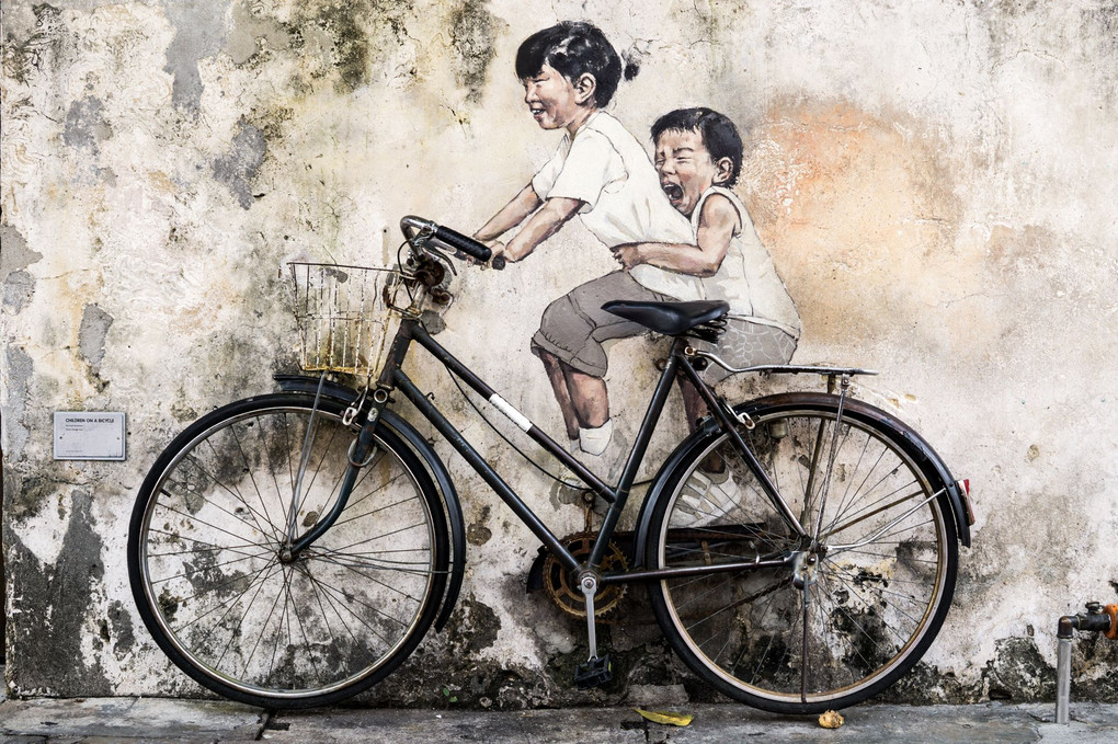 CHILDREN ON A BICYCLE