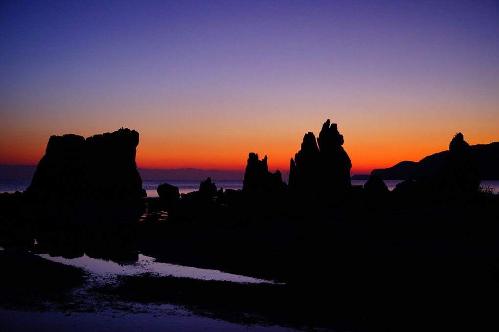ふたつのダルマ太陽と、夜明け前の橋杭岩