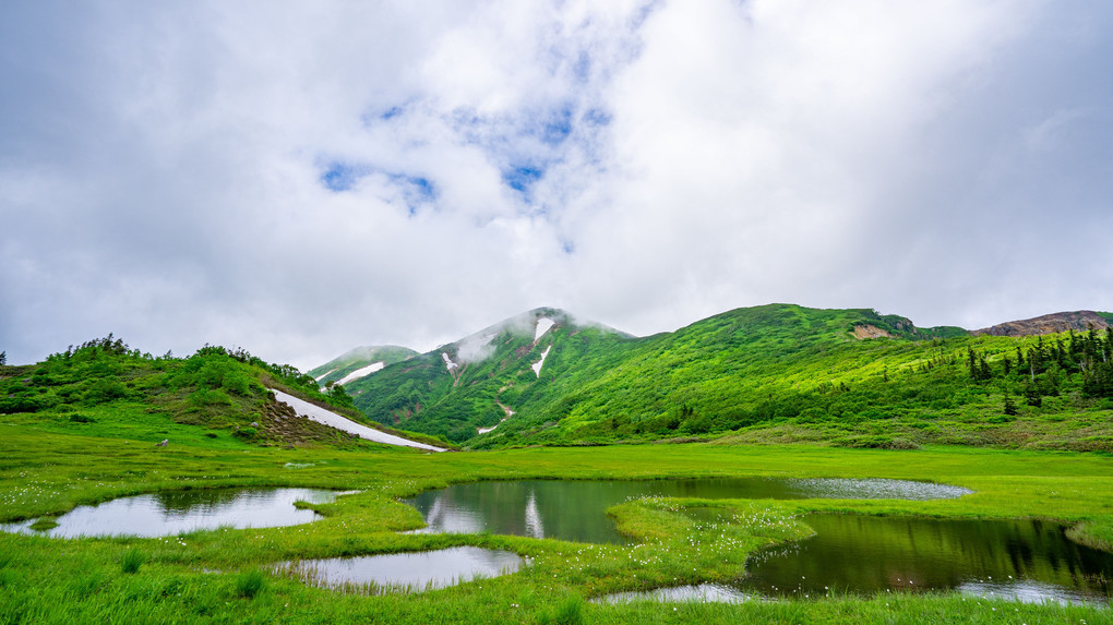 雲間から、