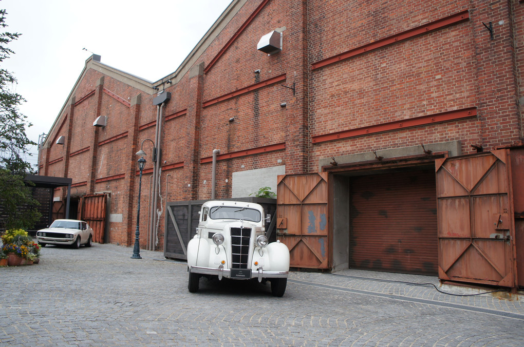 classic car in red brick warehouse